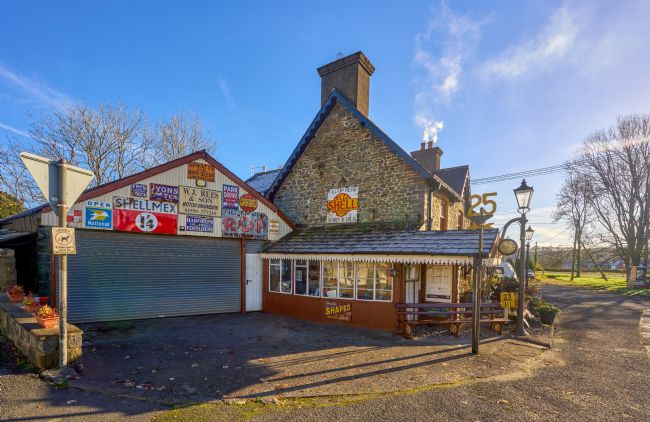Gordon Maclaren | Old Garage, Llanwrda with Vintage Motor Signs